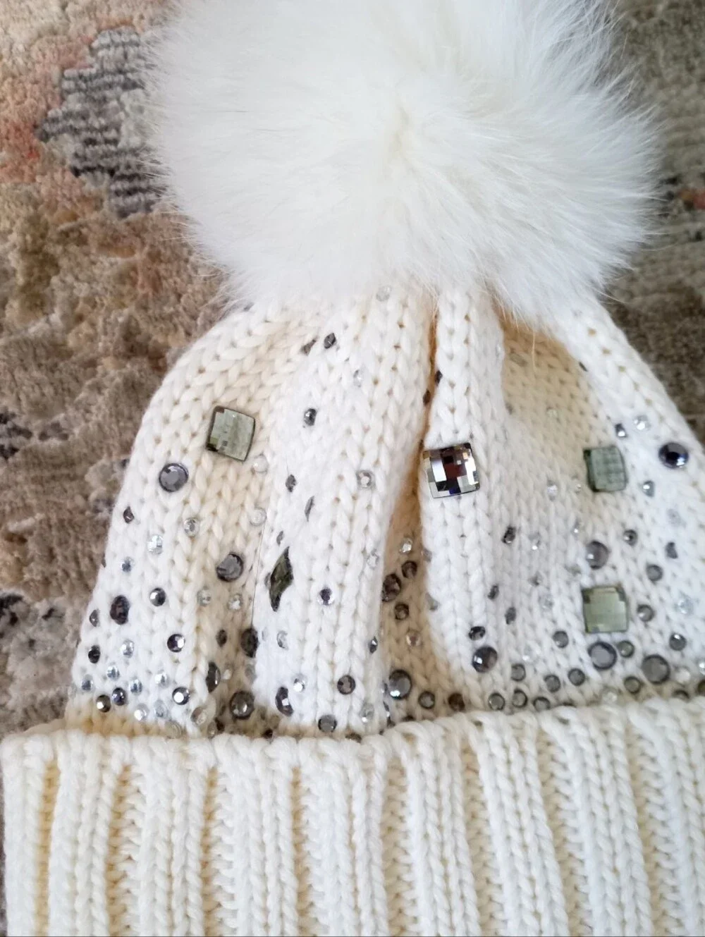 Regina Pour OG Italian cream color knit wool beanie with a real fur pom pom